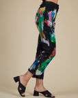 Side view of the Rainbow Magic Waters Work Pants on Alex