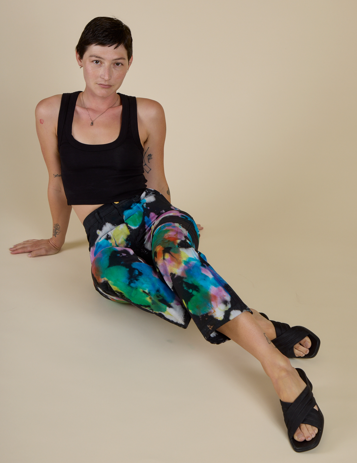 Alex wearing the Rainbow Magic Waters Work Pants with the Black Cropped Tank