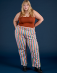 Juliet is 5’7” and wearing 1XL Work Pants in Rainbow Stripe paired with burnt terracotta Cropped Tank