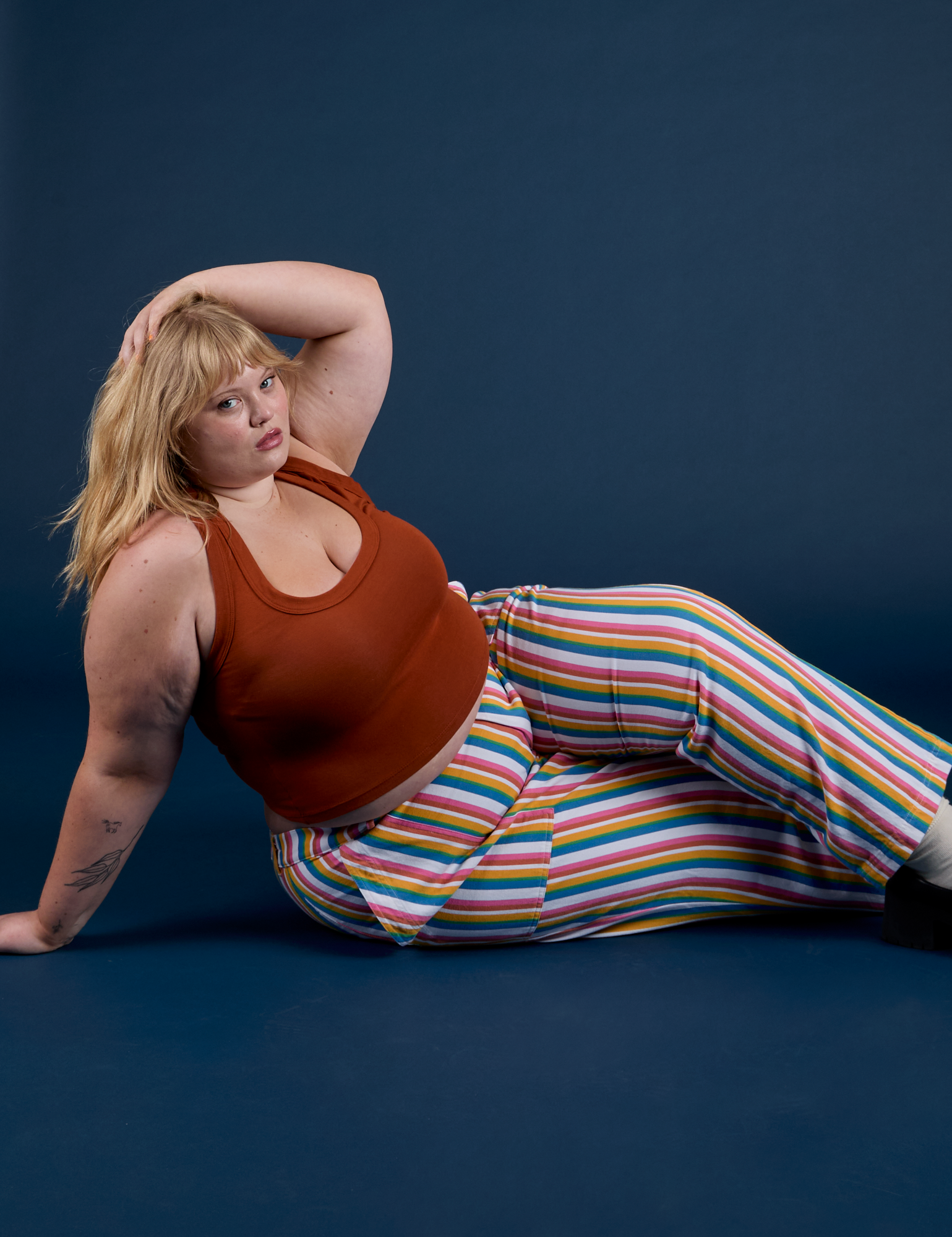 Work Pants in Rainbow Stripe and burnt terracotta Cropped Tank on Juliet