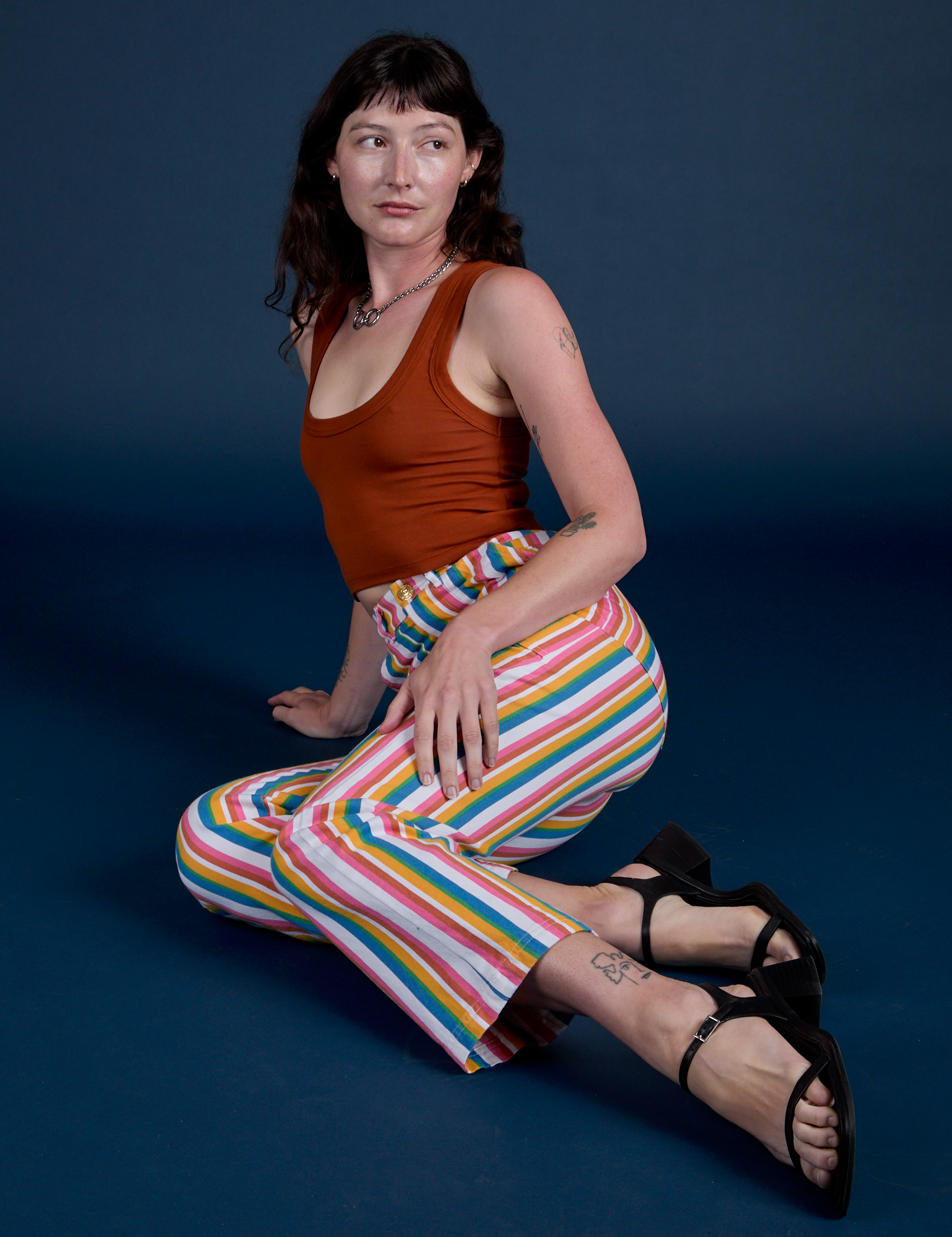 Work Pants in Rainbow Stripe and burnt terracotta Cropped Tank on Alex