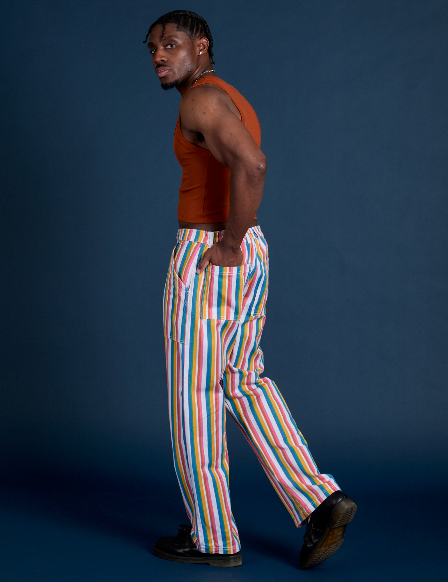 Work Pants in Rainbow Stripe angled back view on Isaac