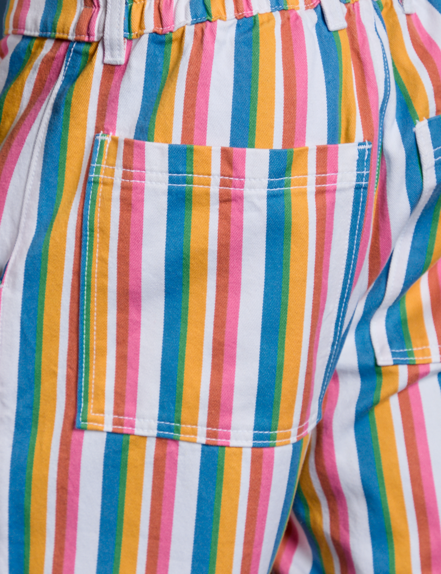 Close up of back pocket of Work Pants in Rainbow Stripe on Isaac