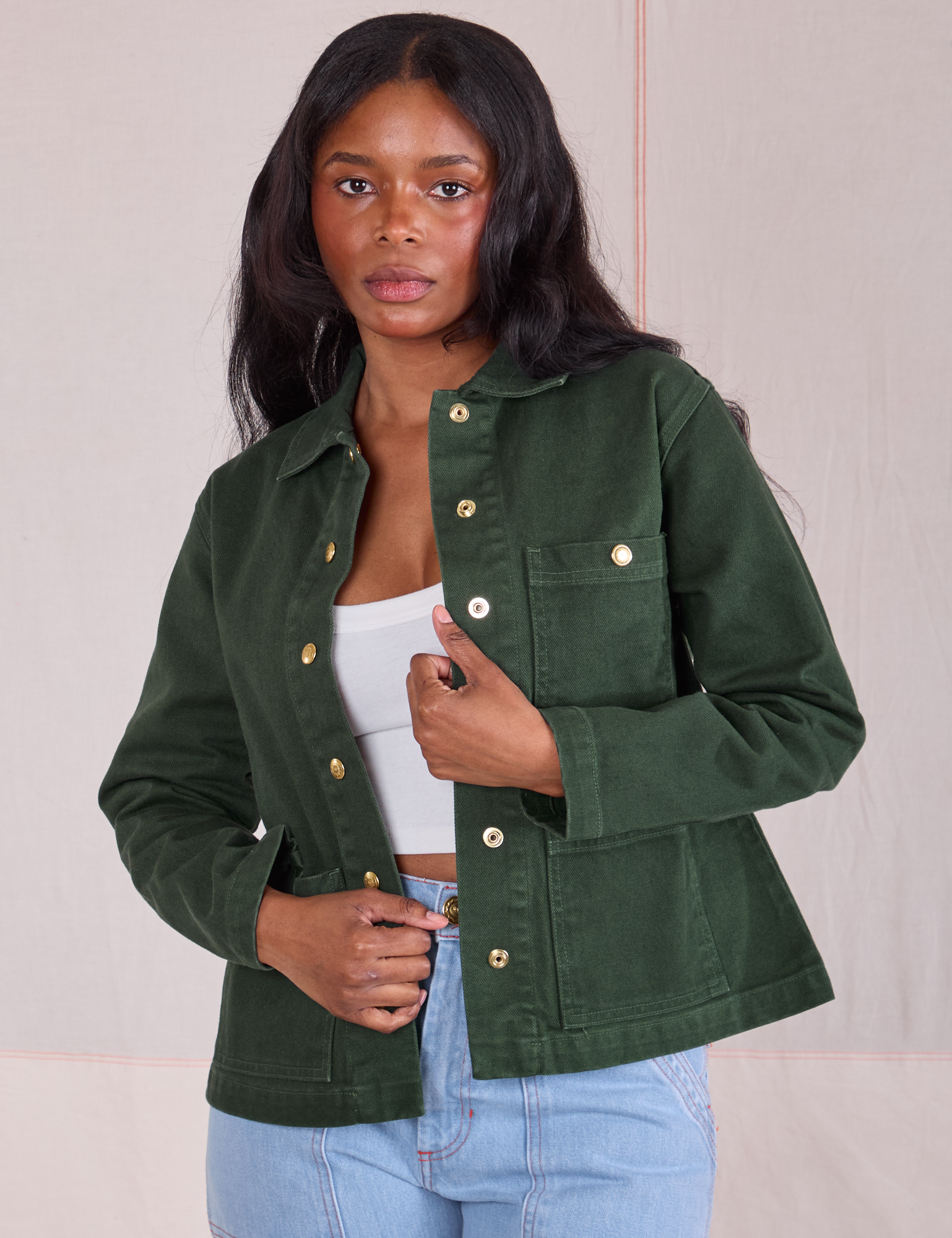 Kandia is wearing Denim Work Jacket in Swamp Green