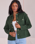 Kandia is wearing Denim Work Jacket in Swamp Green