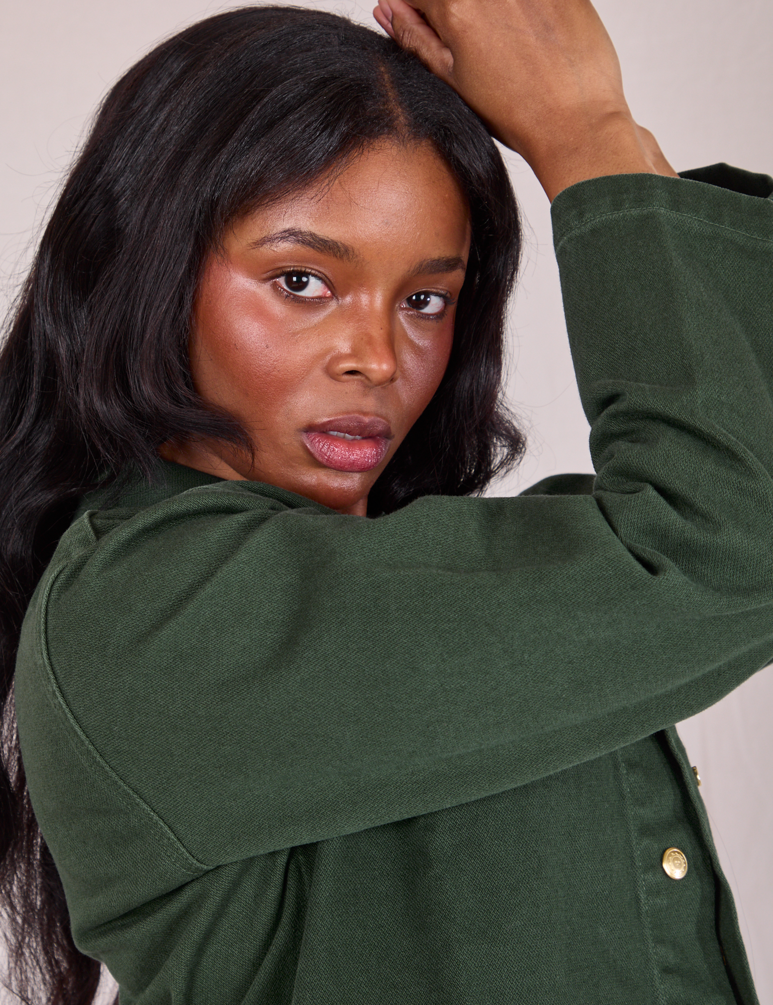 Denim Work Jacket in Swamp Green sleeve close up on Kandia