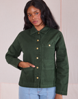 Kandia is wearing a buttoned up Denim Work Jacket in Swamp Green