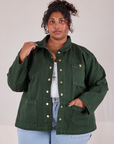 Morgan is 5'5" and wearing 1XL Denim Work Jacket in Swamp Green