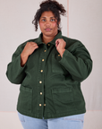 Morgan is wearing a buttoned up Denim Work Jacket in Swamp Green