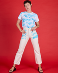 Alex wearing the Cloud Coverage Airbrush Vintage Tee tucked into the Pockets of Sky Airbrush Work Pants