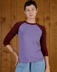 Alex is 5'8" and wearing P Faded Grape/Wine Colorblock Raglan Tee