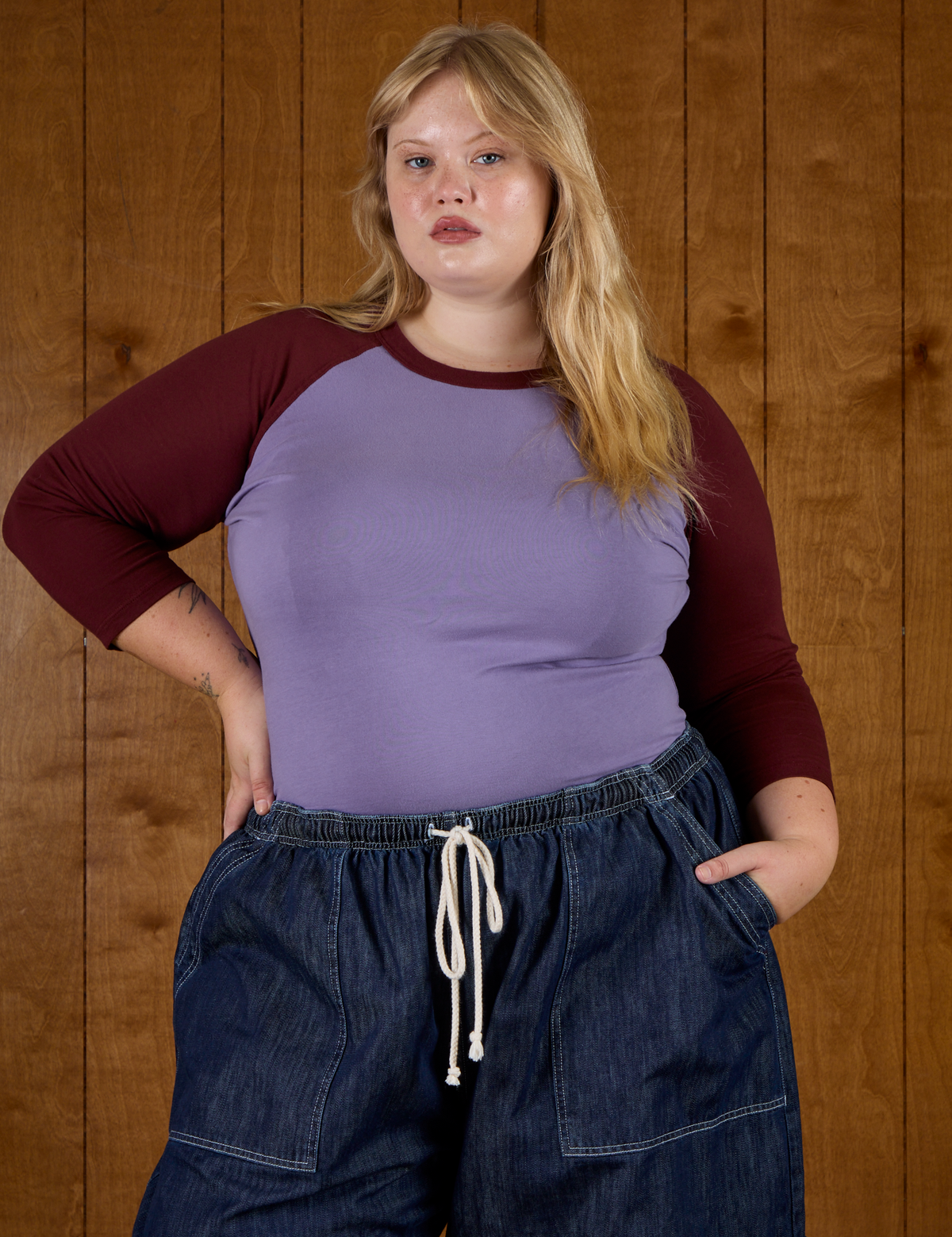 Juliet wearing the Faded Grape/Wine Colorblock Raglan Tee