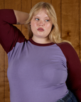 Close up of Juliet wearing the Faded Grape/Wine Colorblock Raglan Tee