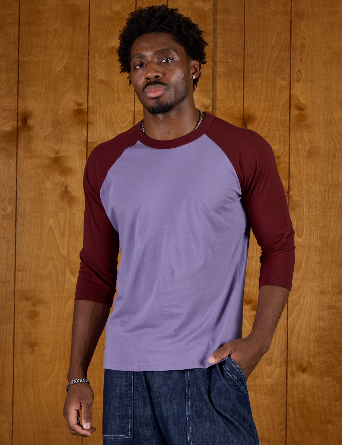 Isaac is 5'9" and wearing M Faded Grape/Wine Colorblock Raglan Tee