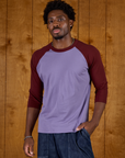 Isaac is 5'9" and wearing M Faded Grape/Wine Colorblock Raglan Tee