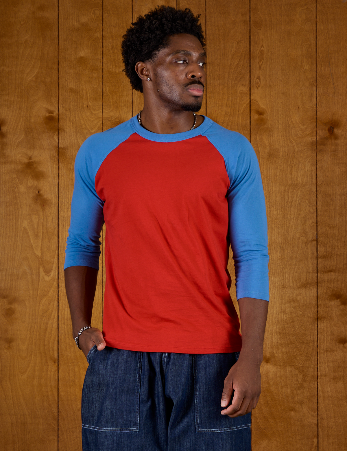 Isaac wearing the Mustang Red/Blue Colorblock Raglan Tee