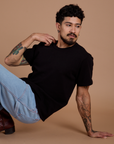 Jesse is wearing the Burly Tee in Basic Black