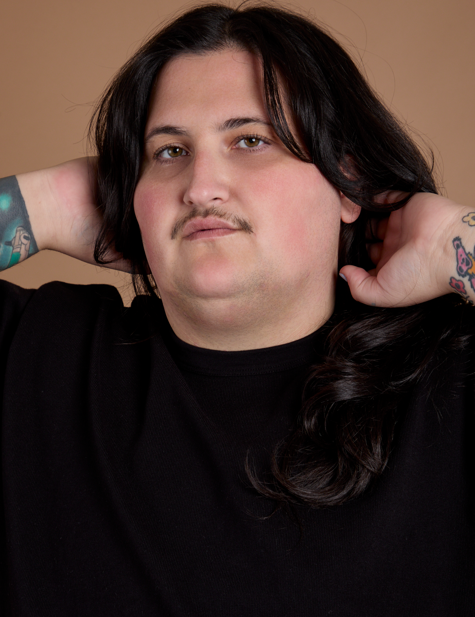 Burly Tee in Basic Black front close up on Sam