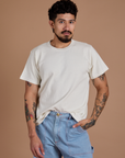 Jesse is wearing Burly Tee in Vintage Tee White
