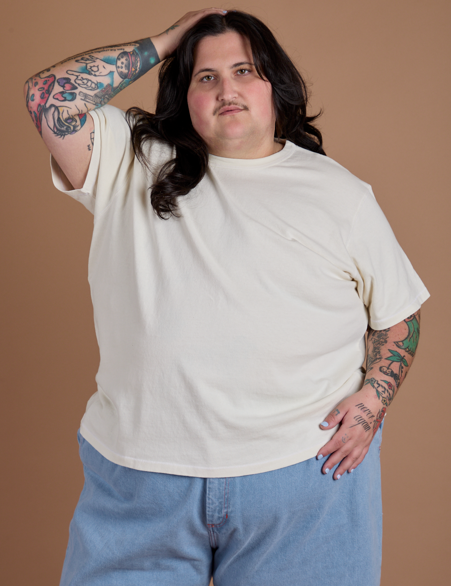 Sam is 5'10" and wearing 2XL Burly Tee in Vintage Tee White