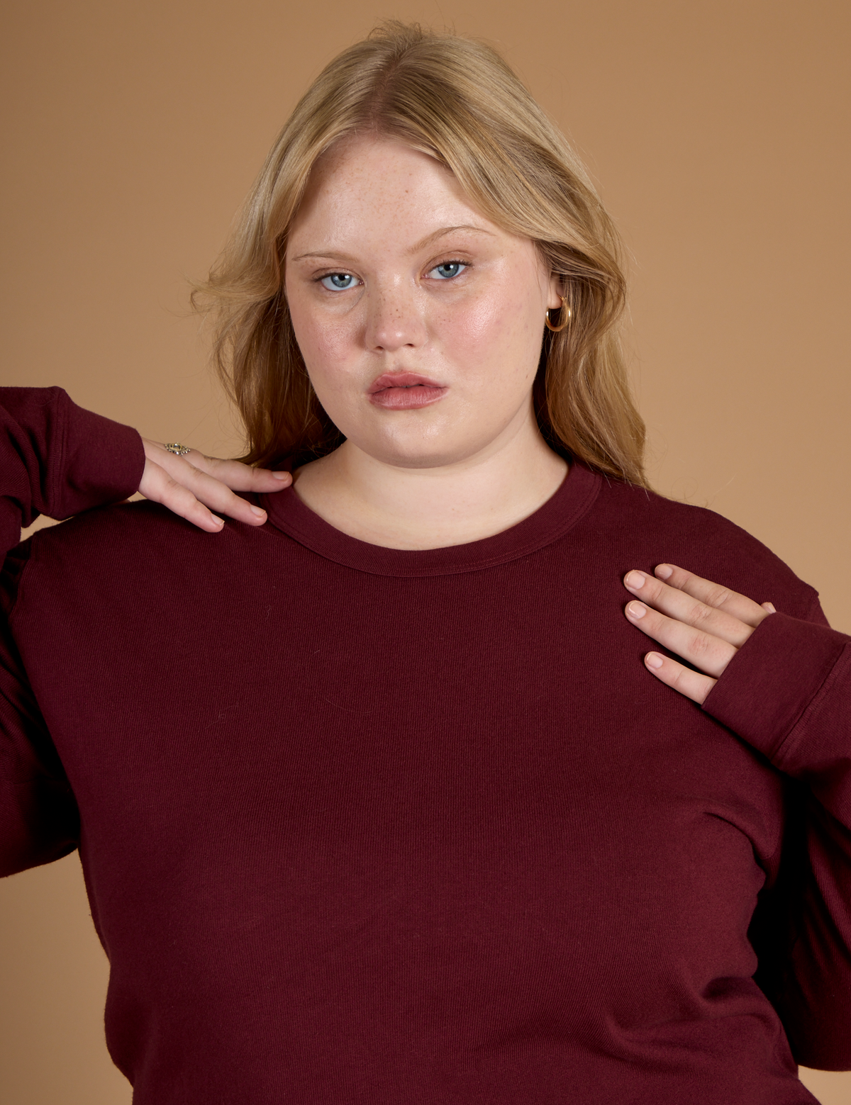 Close up of Juliet wearing the Red Wine Long Sleeve Burly Tee