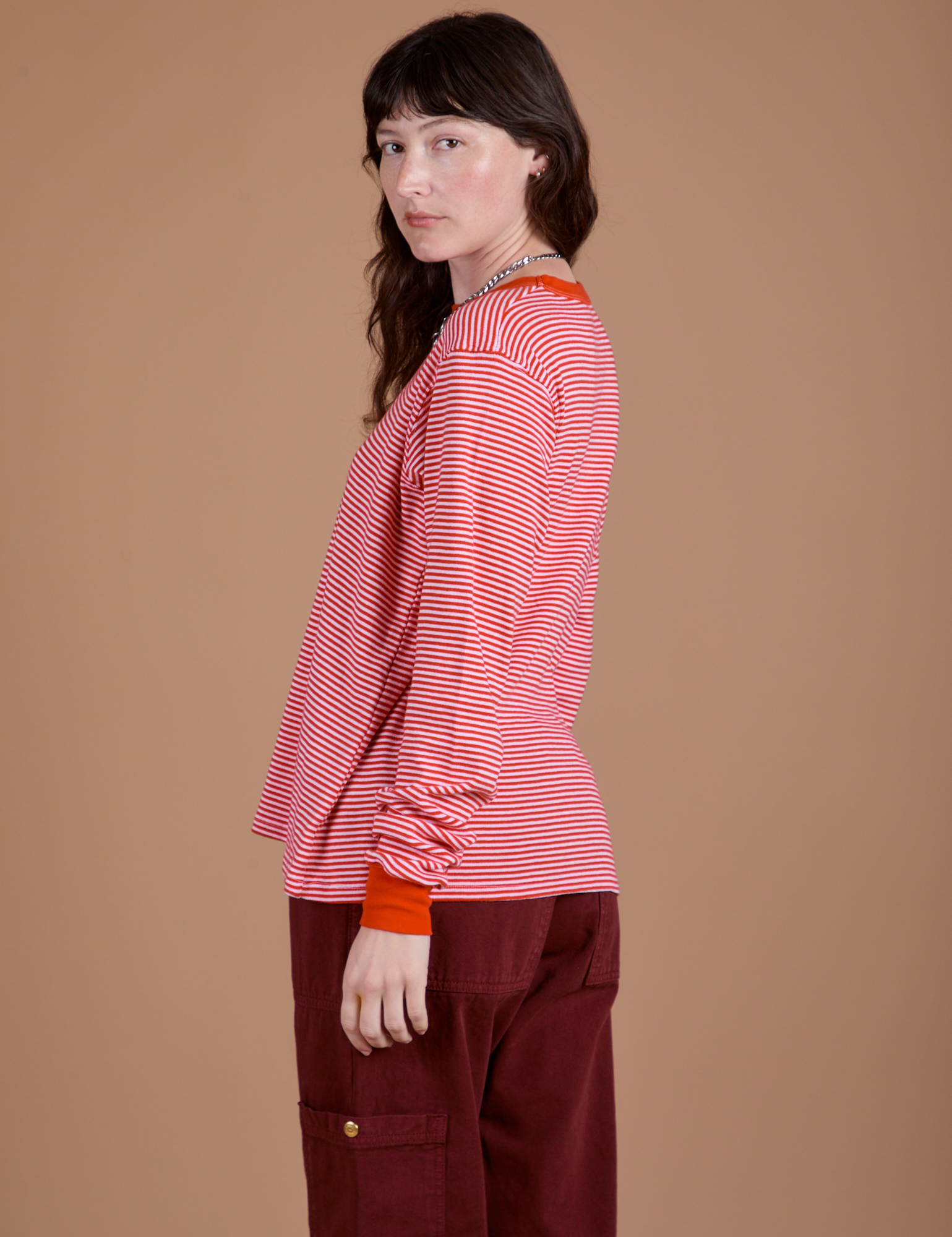 Long Sleeve Burly Tee in Red/White Stripe side view on Alex