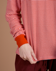 Long Sleeve Burly Tee in Red/White Stripe close up on Alex