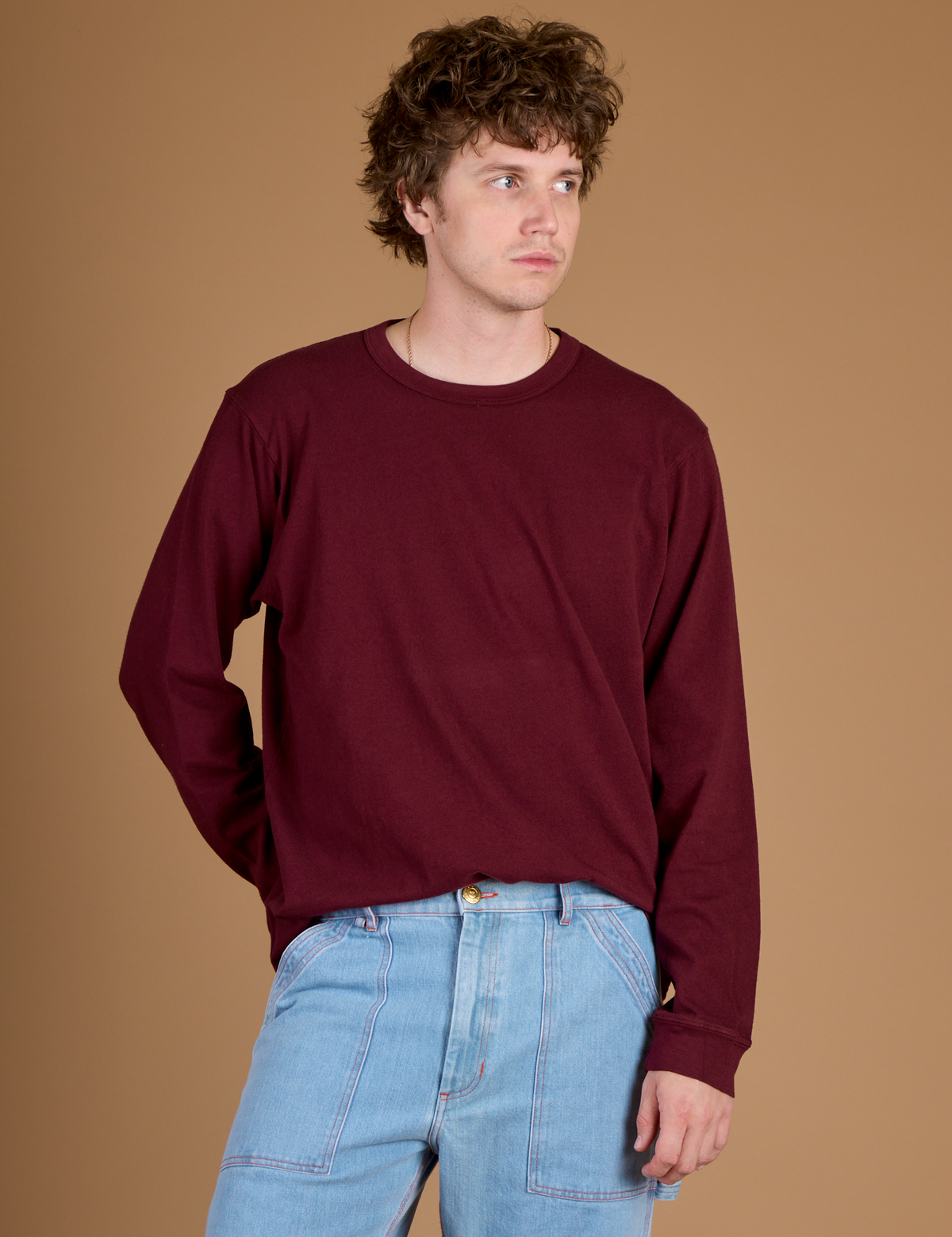 Quinn wearing the Red Wine Long Sleeve Burly Tee