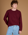 Quinn wearing the Red Wine Long Sleeve Burly Tee