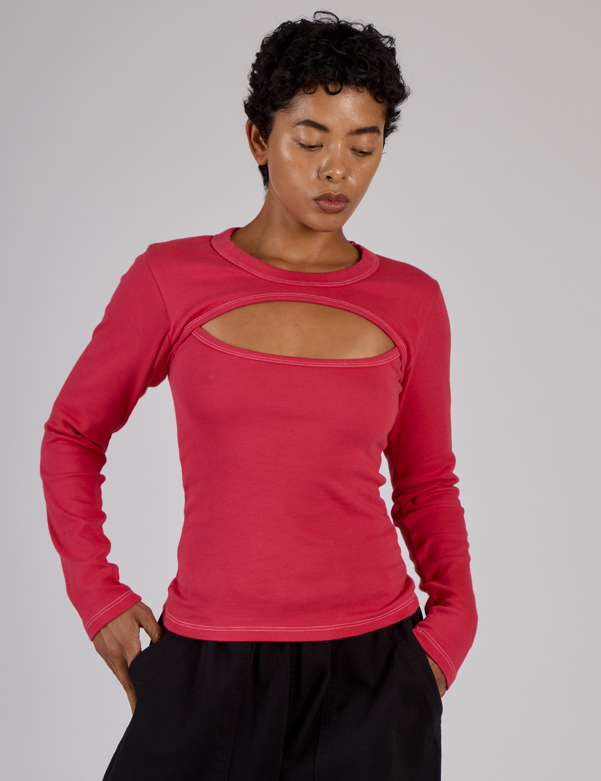 Mika wearing the Hot Pink Long Sleeve Porthole Tee