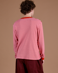 Long Sleeve Burly Tee in Red/White Stripe back view on Quinn