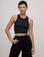 Alex is 5'8" and wearing P Basic Black Deep Cut Racerback