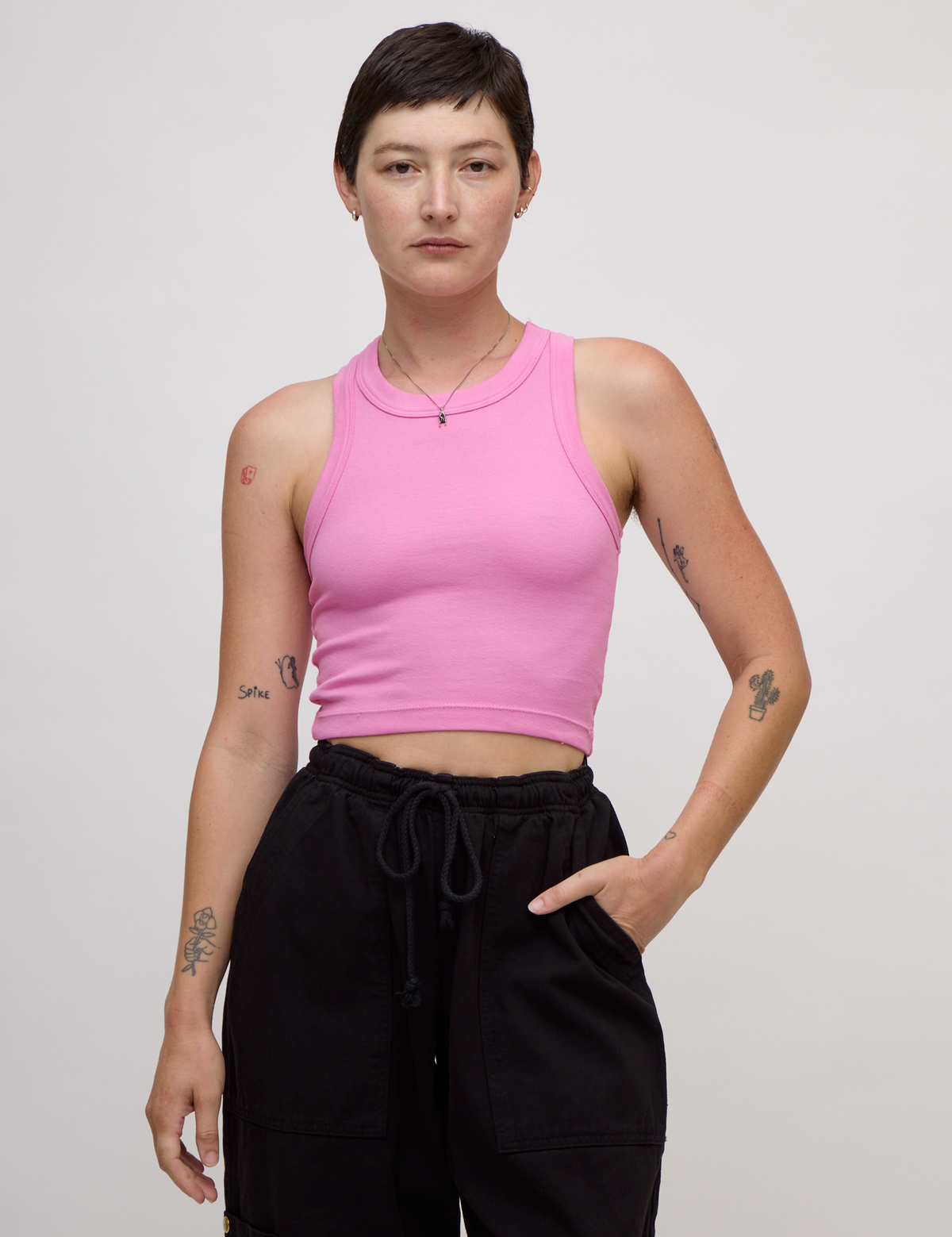 Close up of Alex in the P Bubblegum Pink Deep Cut Racerback