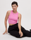 Alex is 5'8" and wearing P Bubblegum Pink Deep Cut Racerback