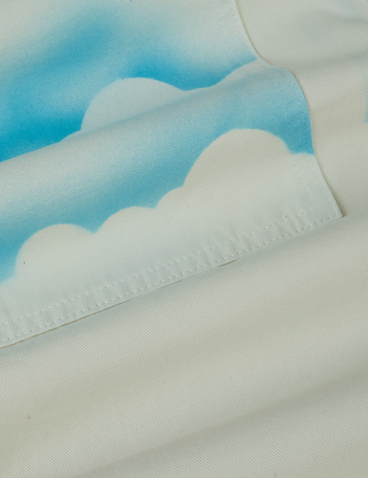 Fabric close up of the Pockets of Sky Airbrush Work Pants