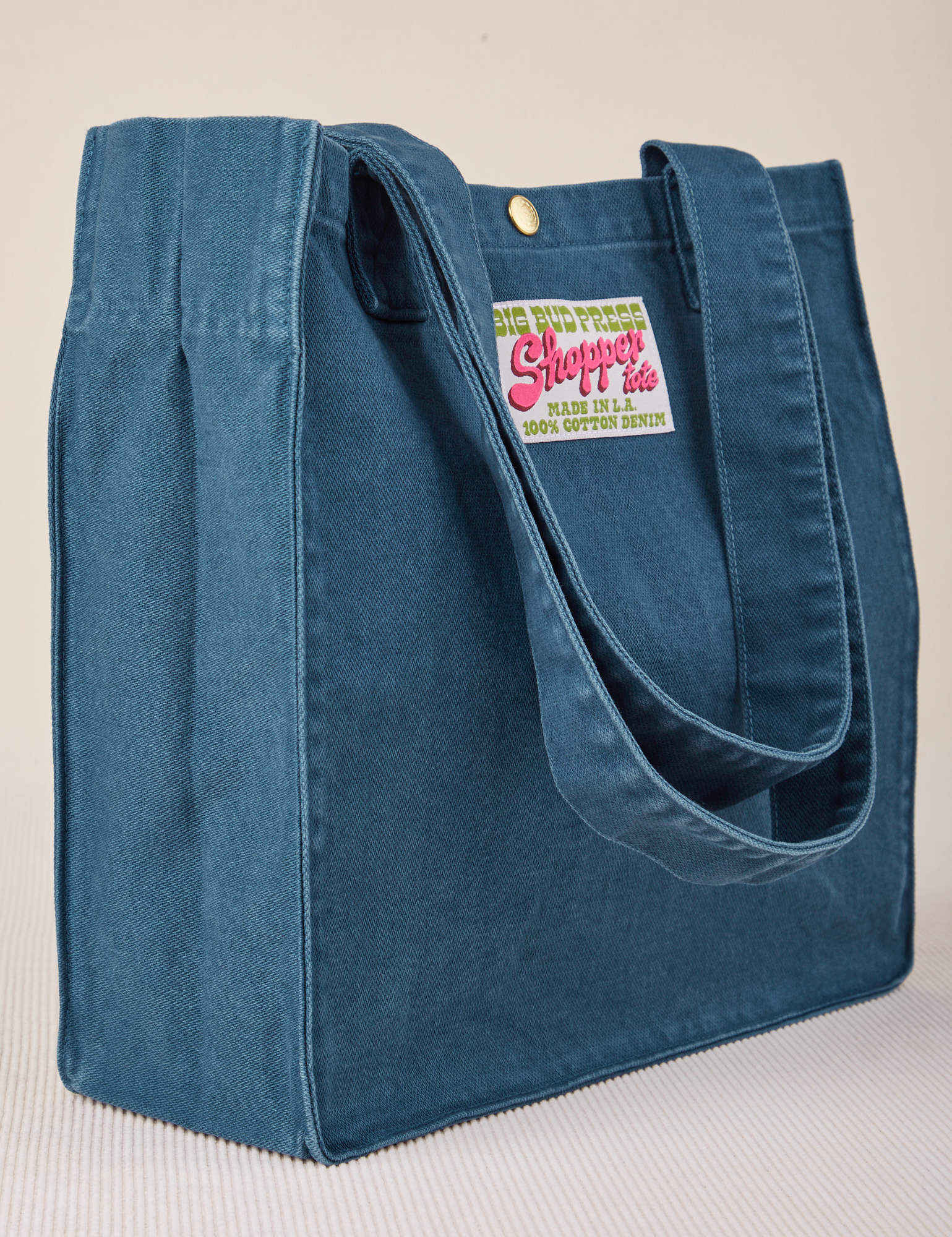 Angled view of Shopper Tote Bag in Lagoon