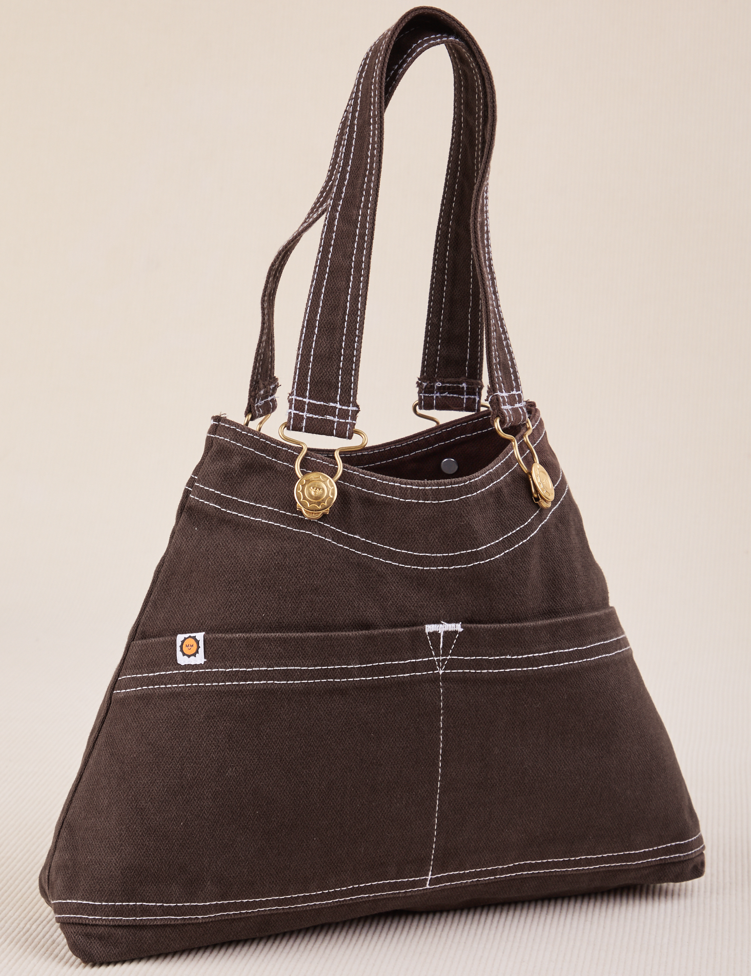 Angled view of Overall Handbag in Espresso Brown