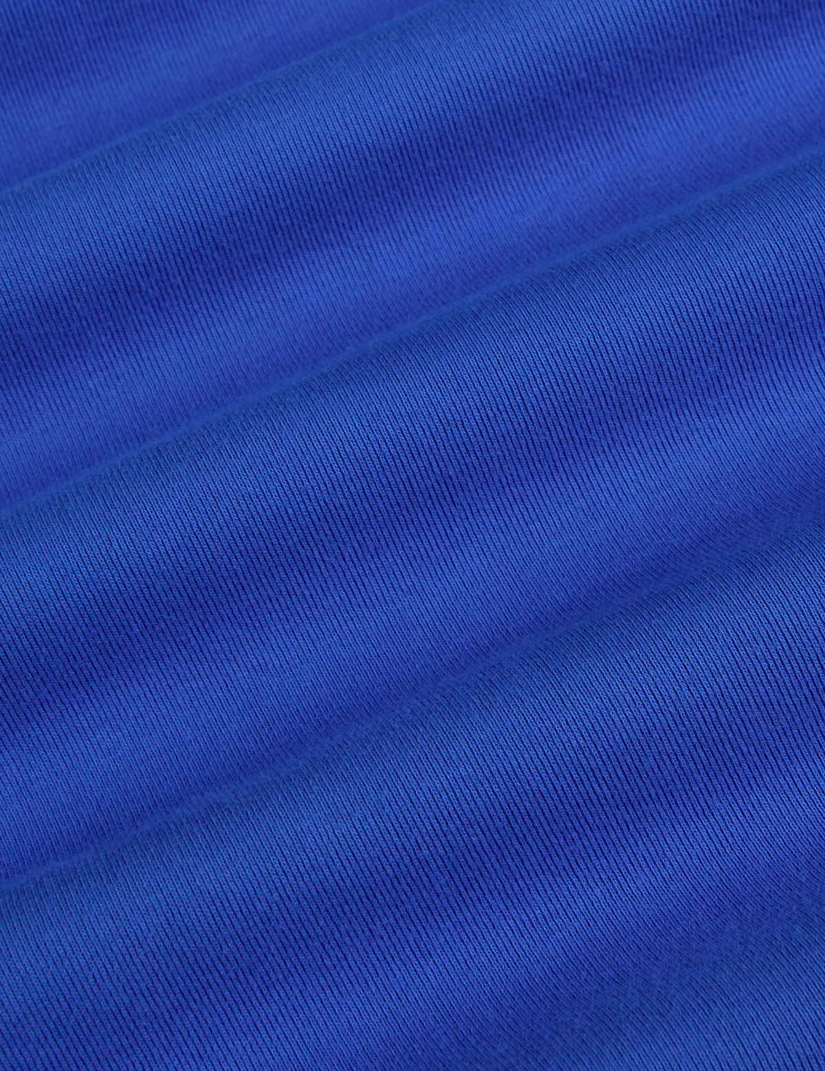 Fabric close up of the Cornflower Blue Deep Cut Racerback