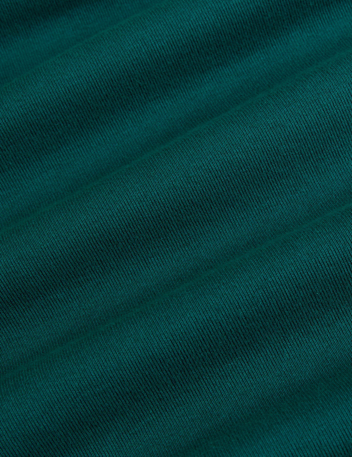 Fabric close up of the Hunter Green Deep Cut Racerback