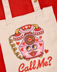 Call Me Shopper Tote with a pink vintage phone graphic, red hearts and face