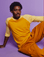 Isaac is 5'10" and wearing M Mustard Yellow/Butter Raglan Tee