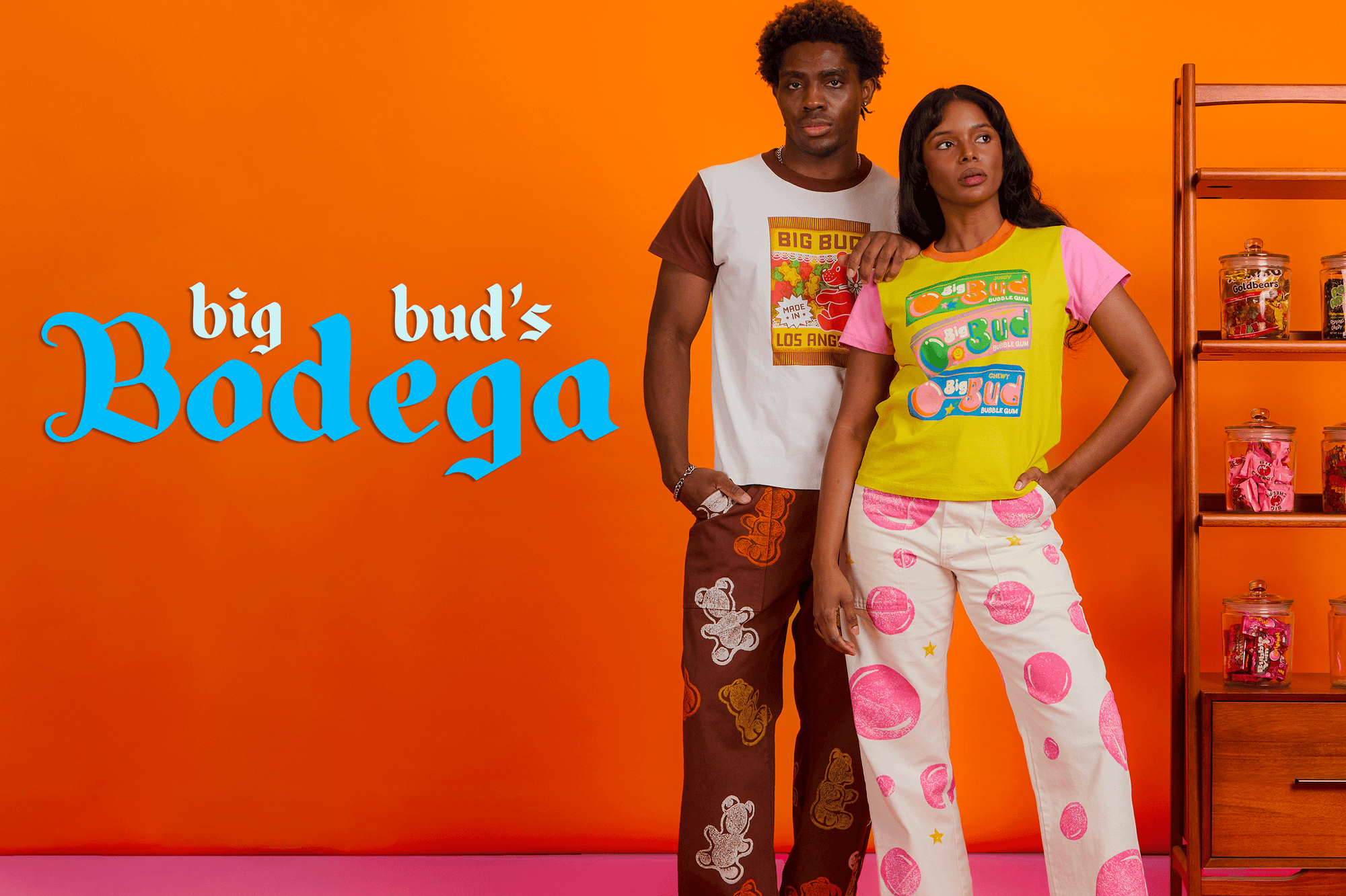Isaac is wearing Vintage Tee in Gummy Bears and matching Work Pants. Kandia is wearing Vintage Tee in Bubblegum with Paintstamp Bubblegum Work Pants