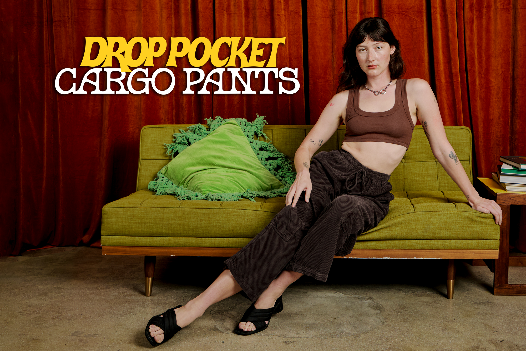 Alex is wearing Corduroy Drop Pocket Cargo Pants in Espresso Brown and Mini Tank in Fudgesicle Brown