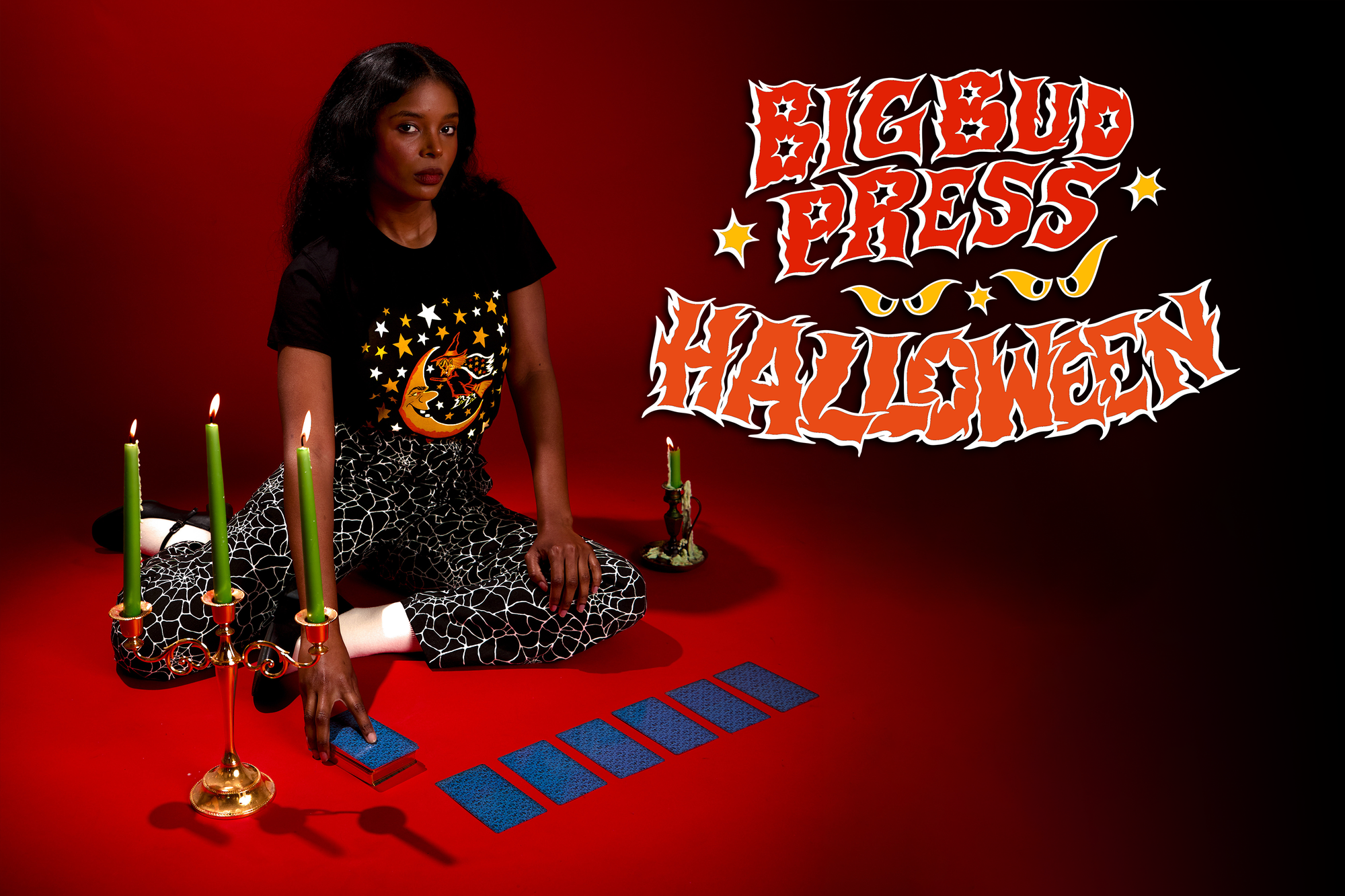 Kandia is wearing the Vintage Tee in Moon & Witch paired with Work Pants in Spider Webs