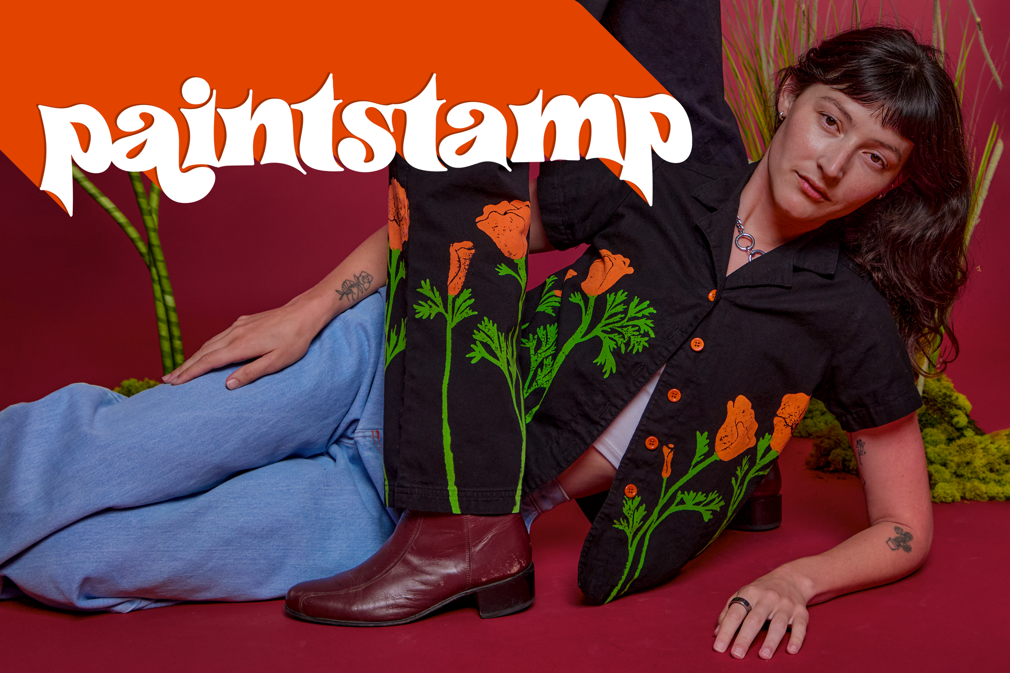 Alex is wearing the Paintstamp Pantry Button-Up in Poppy. Jesse is wearing the Paintstamp Work Pants in Poppy