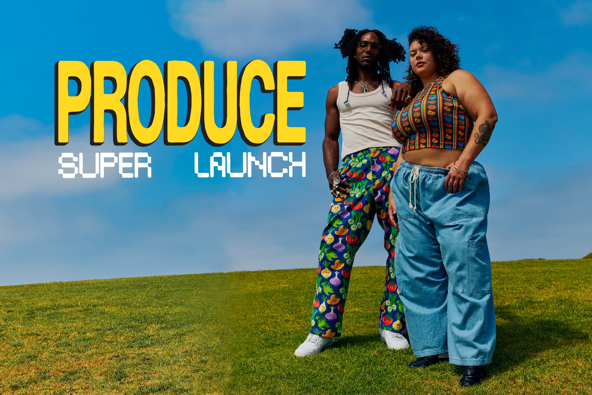 Jerrod is wearing the vintage off white tank top and veggie village work pant. Kristen is wearing the fruit fantasy racerback and light wash denim cargo jean.