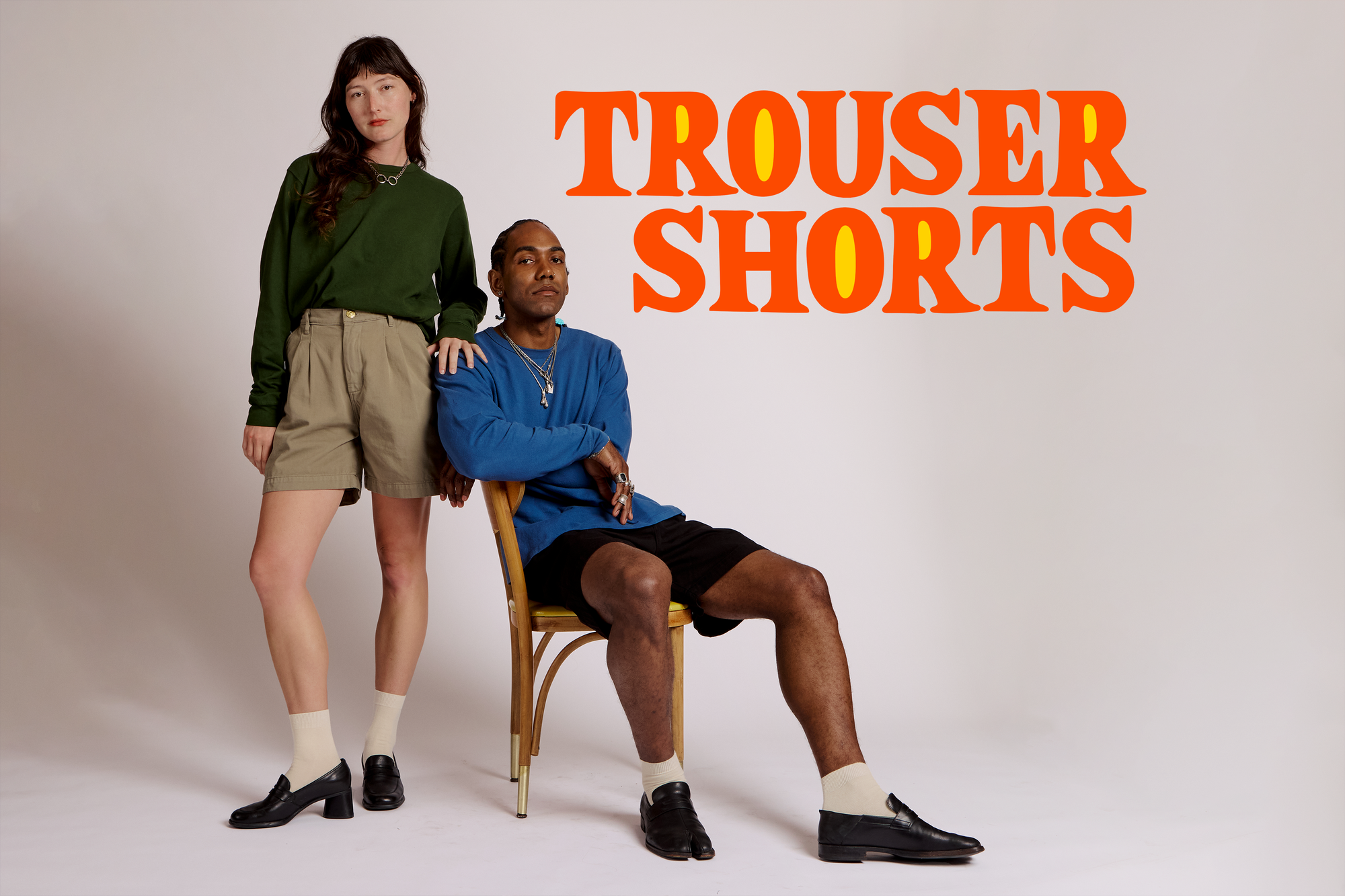 Alex and Jerrod are wearing trouser shorts in khaki grey and black