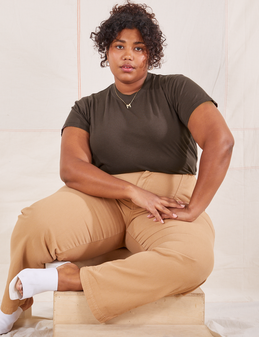 Morgan is wearing L Organic Vintage Tee in Espresso Brown paired with tan Work Pants