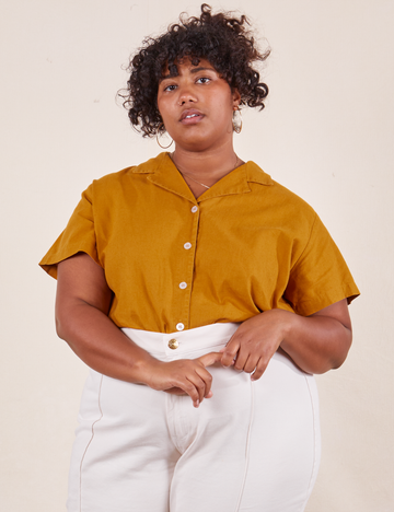 Morgan is wearing 1XL Pantry Button-Up in Spicy Mustard tucked into vintage off-white Western Pants