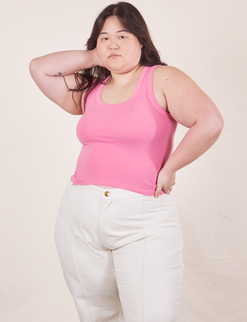 Ashley is wearing size L Tank Top in Bubblegum Pink paired with vintage off-white Western Pants